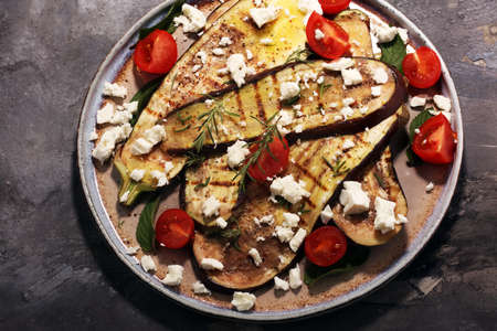 grilled eggplants seasoned with olive oil, garlic and mint. Dietary vegetarian snack saladの写真素材