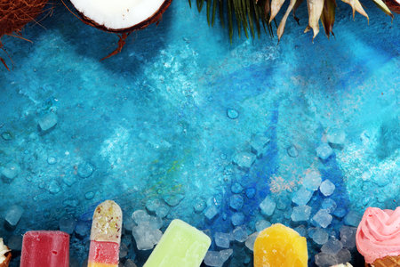 Vanilla frozen yogurt or soft ice cream in waffle cone and Colorful ice cream with tropical fruits