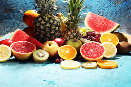 Fresh organic fruits background. Healthy eating concept. Flat lay.の写真素材