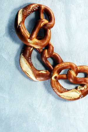 German pretzels with salt close-up on the table.の写真素材