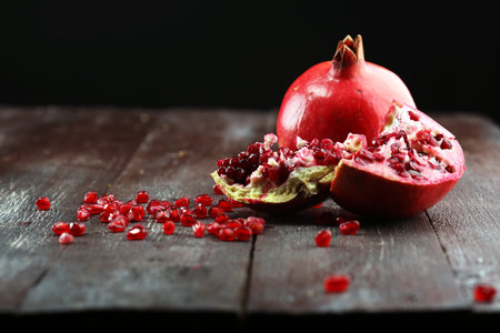 Ripe and juicy pomegranate. Red organic pomegranateの写真素材