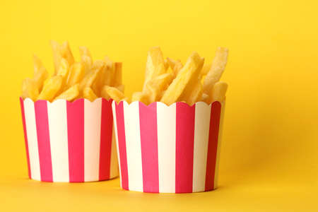Potatoes French Fries in Red and white Carton Package Box. Fast Foodの写真素材