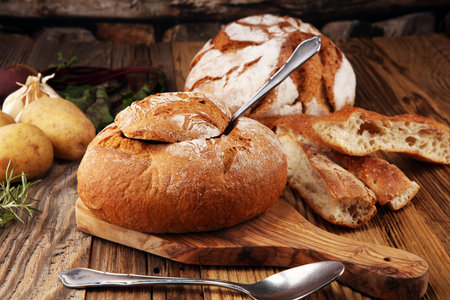 Homemade potato cream soup, served in bread bowl