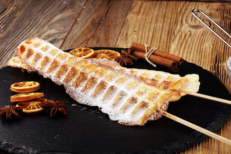 Belgium waffles with powder sugar. popsicles with chocolate and waferの写真素材