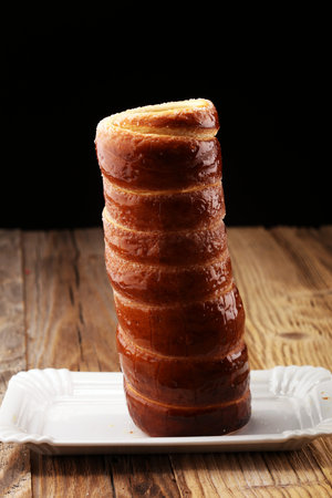 chimney cake. street food pastry with sugar for christmas