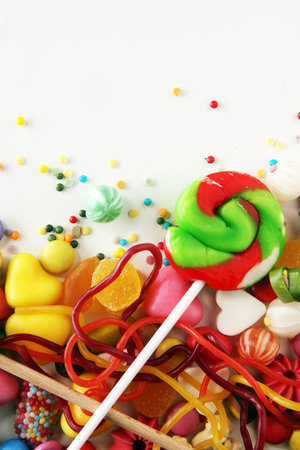 candies with jelly and sugar. colorful array of different childs sweets and treats