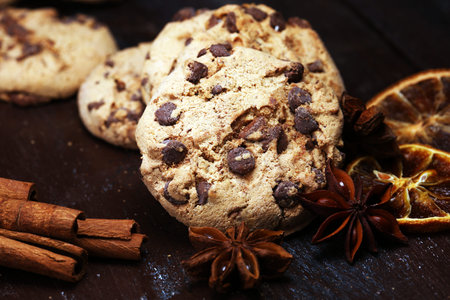 Chocolate cookies on rustic table. Chocolate chip cookies shot.の写真素材