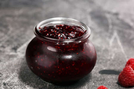 raspberry jam with fresh raspberries. marmalade in jar.の写真素材