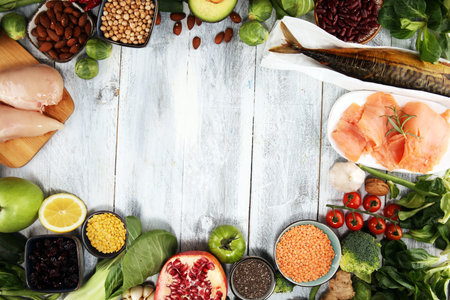 Healthy food clean eating selection. fruit, vegetable, seeds, superfood, cereals, leaf vegetable and...