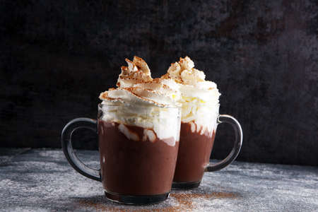 Hot chocolate cocoa with whipped cream for xmas on table.の写真素材