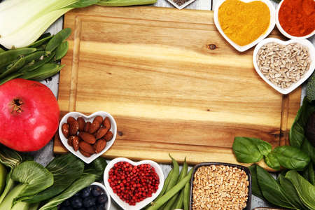 Healthy food clean eating selection. fruit, vegetable, seeds, superfood, cereals, leaf vegetable. veggie or vegan foodの写真素材