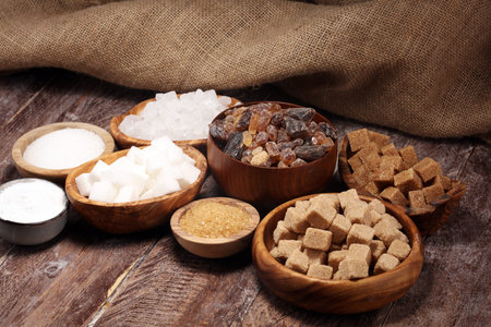 Various types of sugar, brown sugar and white