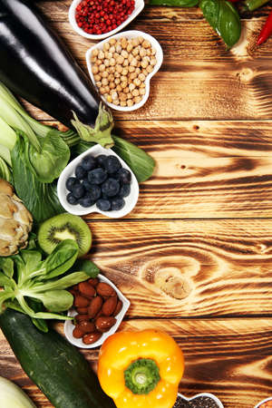 Healthy food clean eating selection. fruit, vegetable, seeds, superfood, cereals, leaf vegetable. veggie or vegan foodの写真素材