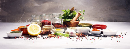 Spices and herbs on table. Food and cuisine ingredients on white table