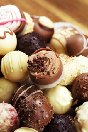 a lot of variety chocolate pralines, belgian confectionery gourmet chocolate confectionery
