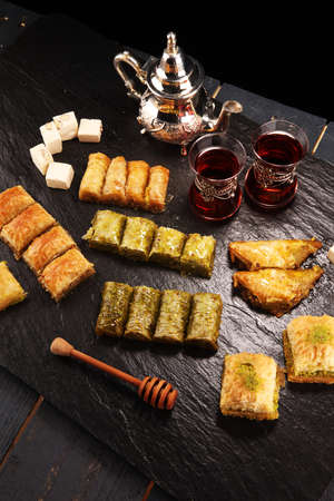 Middle eastern or arabic dishes. Turkish Dessert Baklava with pistachio.の写真素材