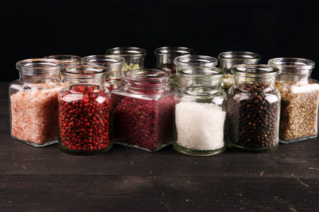 assortment of spices in glass on table. Food and cuisine ingredients with pepper