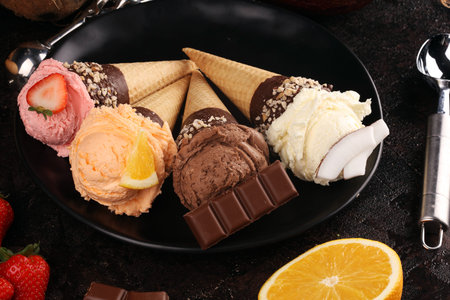 Ice cream. Set of ice cream scoops of different colors and flavours with berries, nuts and fruits...