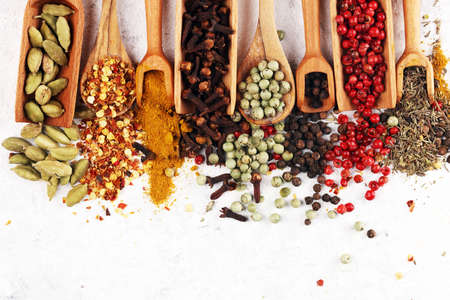 Spices with pepper on table. Food and cuisine ingredients for cookingの写真素材