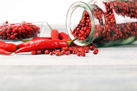 red hot bird chili pepper nature background with pepper corns chilliの写真素材