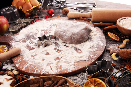 Baking christmas cookies. Typical cinnamon stars bakery with spices. xmas decoration