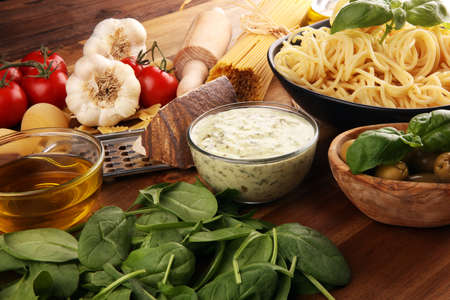 Spaghetti with gorgonzola and spinach souce and ingredientsの写真素材