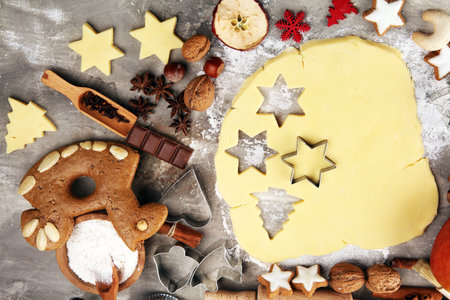 Baking christmas cookies. Typical cinnamon stars bakery with spices. xmas decoration