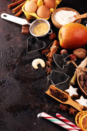 Baking christmas cookies. Typical cinnamon stars bakery with spices. xmas decorationの写真素材