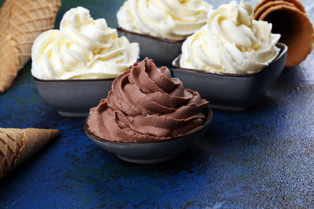 Vanilla soft served ice cream and chocolate.tasty sundae dairy ice cream on table