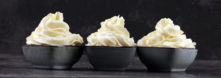 Vanilla soft served ice cream tasty sundae dairy ice cream on tableの写真素材