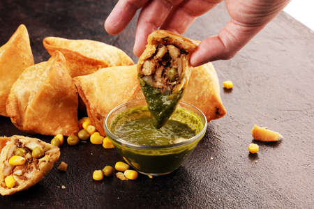 Vegetarian samsa or samosas.Indian special traditional street food punjabi samosa or Coxinha, Croquete and other Fried Brazilian Snacks. traditional fried foodの写真素材