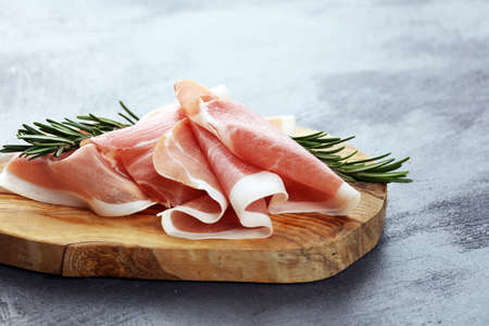 Dry Spanish ham, Jamon Serrano, Bellota, Italian Prosciutto Crudo or Parma ham. meat cuttingの写真素材