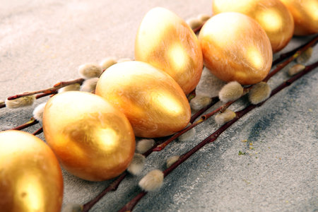 golden easter eggs and pussy willow cats. palm kitten and golden eggs for easter holiday