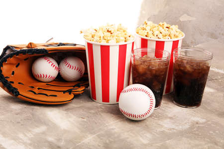 Popcorn on the table with cola softdrink. Baseball party food の写真素材