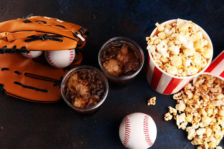 Popcorn on the table with cola softdrink. Baseball party foodの写真素材