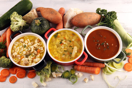 Set of three soups from worldwide cuisines, healthy food. Broth with noodles, beef soup and broth...