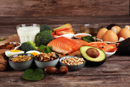 healthy eating and diet concept - natural rich in protein food on tableの写真素材