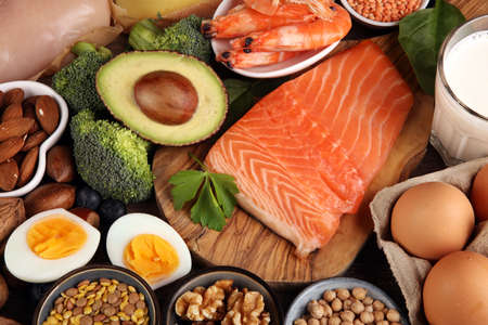 healthy eating and diet concept - natural rich in protein food on tableの写真素材
