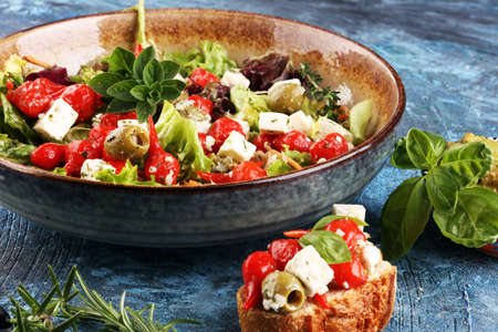 Greek salad with fresh tomatoes, feta cheese and green olives. Antipastoの写真素材