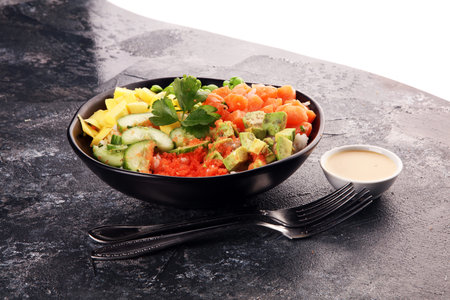 buddha bowl with salmon and avocado with organic vegetables