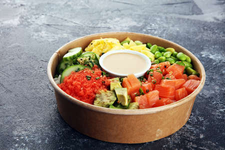 buddha bowl with salmon and avocado with organic vegetablesの写真素材