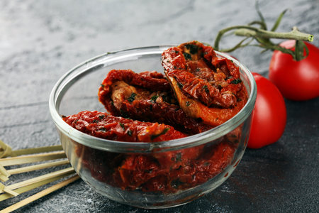 Sun dried tomatoes. tomato halves sun-dried. Antipasti food snackの写真素材