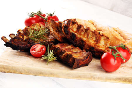 Grilled spare ribs for a tasty bbq meat with spicy barbecue sauceの写真素材
