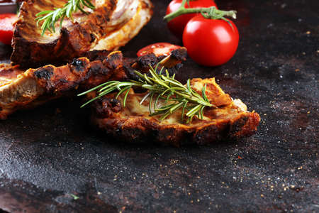 Grilled spare ribs for a tasty bbq meat with spicy barbecue sauceの写真素材