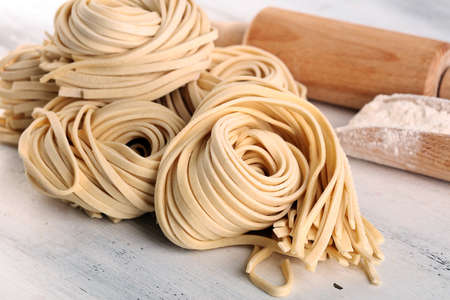 Closeup of raw fresh homemade pasta. fresh italian traditional raw pastaの写真素材