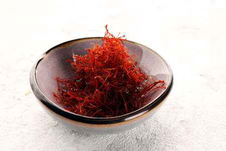 Kesar, Saffron, Crocus Sativus on rustic table, Pile of Saffronの写真素材