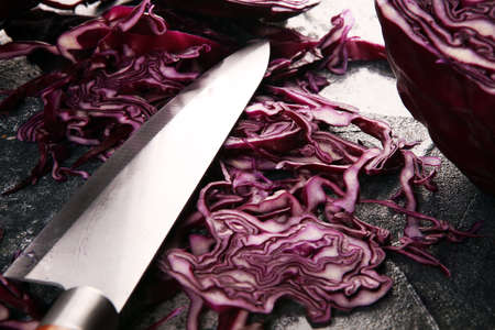 Chopped fresh red cabbage. Prepare sliced  or cut vegetable for cooking purple cabbage salad or coleslaw. Homemade organic  food concept.の写真素材