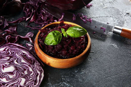 pickled red cabbage and Chopped fresh red cabbage. Prepare sliced vegetable for cooking purple cabbage salad or coleslaw. Homemade fresh food concept.の写真素材