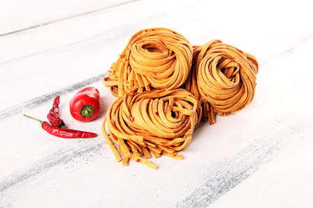 Closeup of raw fresh homemade pasta. fresh italian traditional raw pastaの写真素材