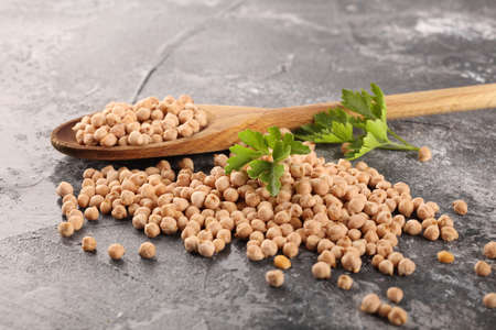 Raw Chickpeas in a bowl. Chickpeas is nutritious food. Healthy and natural vegetarian foodの写真素材